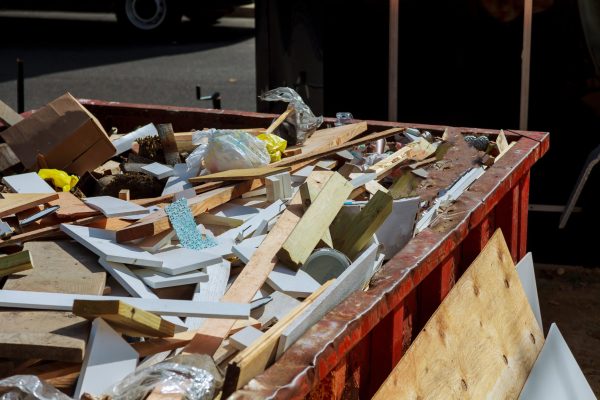 Dumpsters being full with garbage container trash on ecology and environment