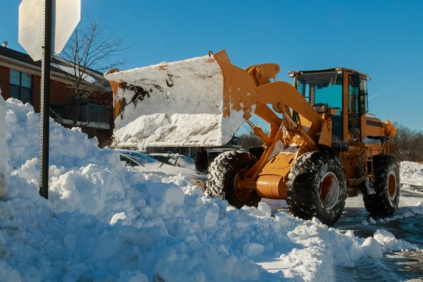 Snow removal vehicle removing snow snow tractor snow removal